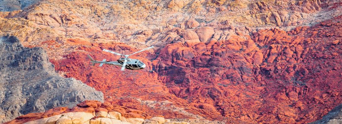 Helicopter over the multi-coloured sandstone of Red Rock Canyon